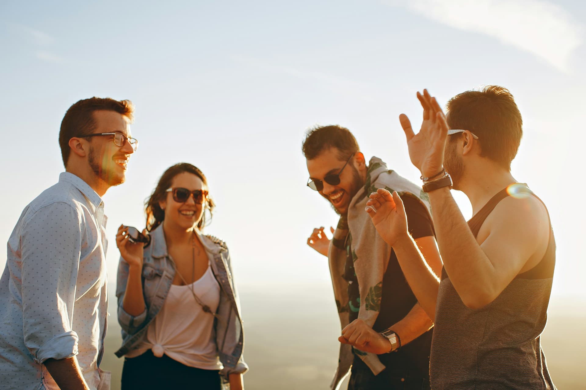 A group of friends having a fun conversation outdoors